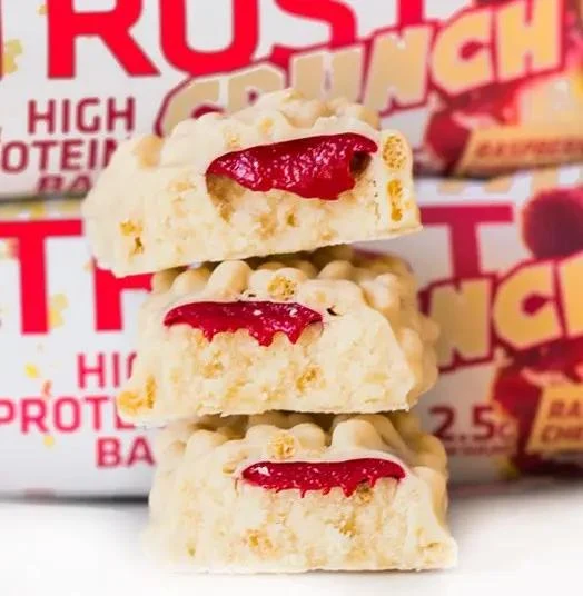 USN Trust Crunch Raspberry Cheesecake - chrupiący baton białkowy Biała Czekolada, Sernik & Maliny